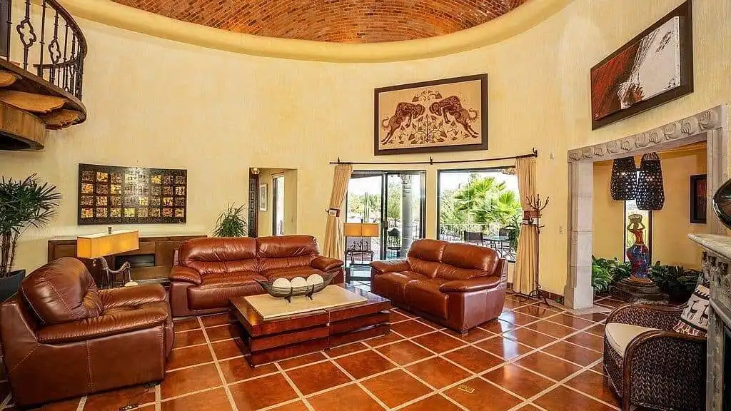 Elegant living room with comfortable leather sofas and stylish decor.