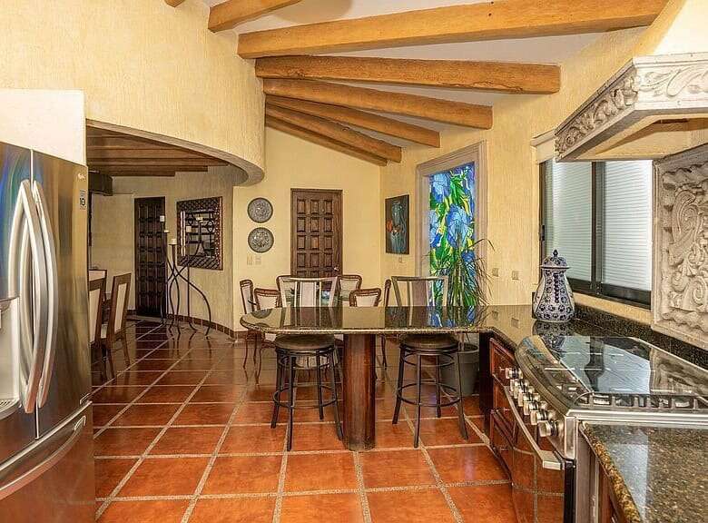 Spacious kitchen and dining area in a lakeside estate in Rancho Los Labradores, San Miguel de Allend.
