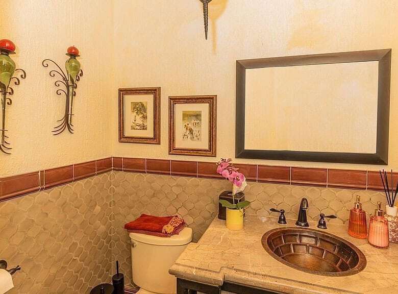 Elegant bathroom with rustic decor in a lakeside estate in San Miguel de Allende.