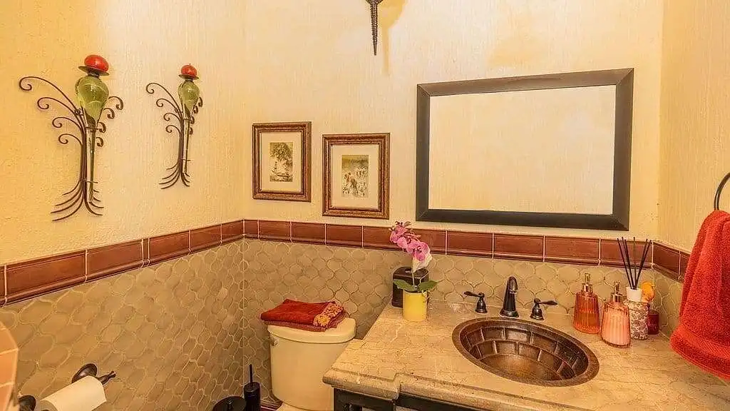 Elegant bathroom with rustic decor in a lakeside estate in San Miguel de Allende.