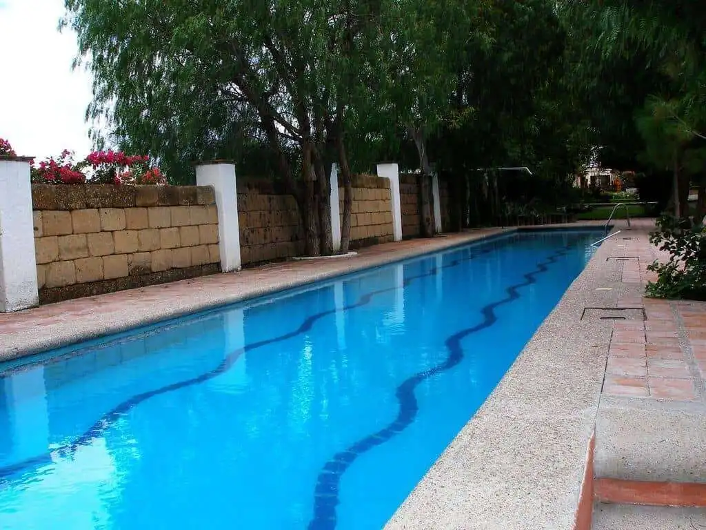 Lakeside swimming pool at luxury estate in Rancho Los Labradores, San Miguel de Allende.
