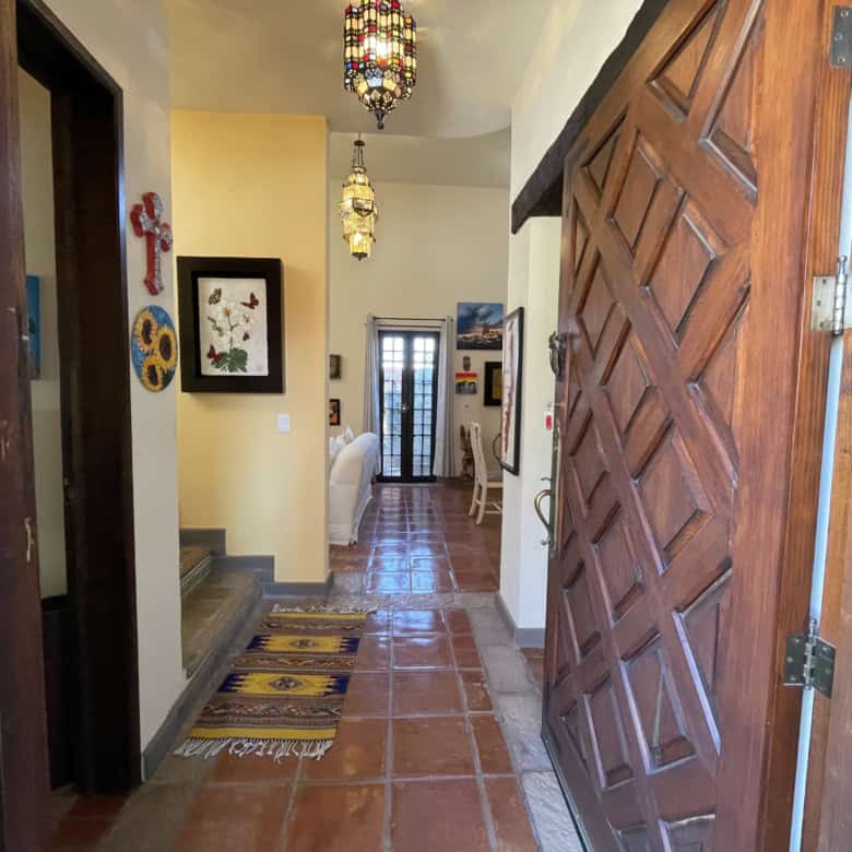 Beautiful Moroccan-inspired interior entrance with colorful decor and traditional lighting.