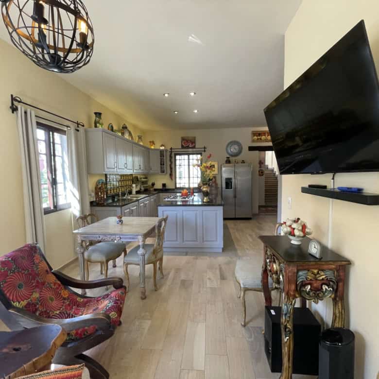 Bright open-plan kitchen and living space with stylish decor and modern appliances. Perfect for comf.