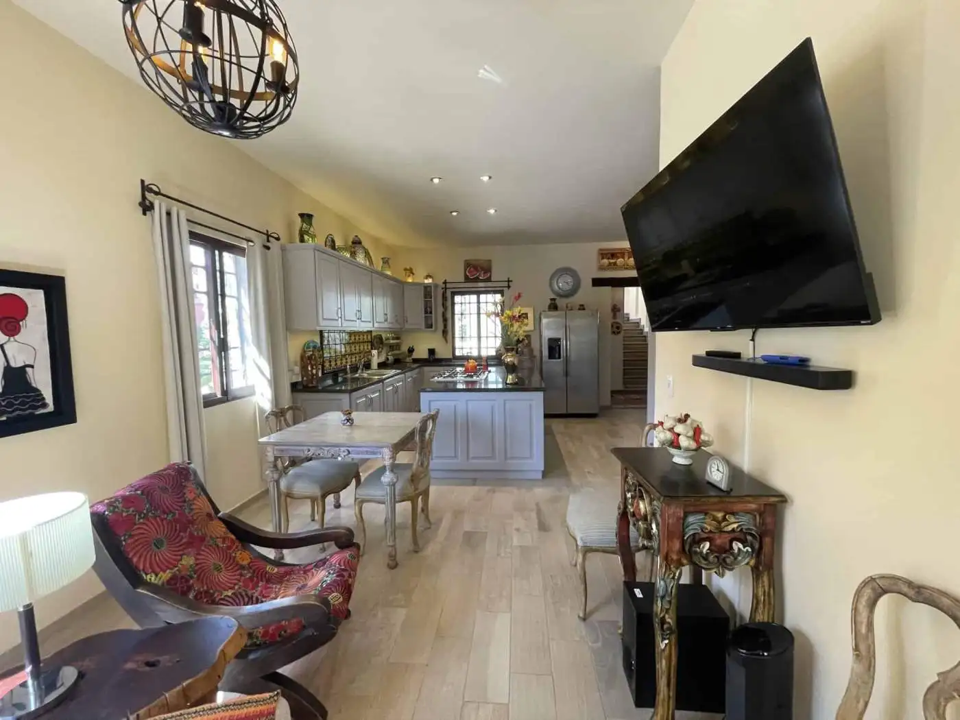 Bright open-plan kitchen and living space with stylish decor and modern appliances. Perfect for comf.