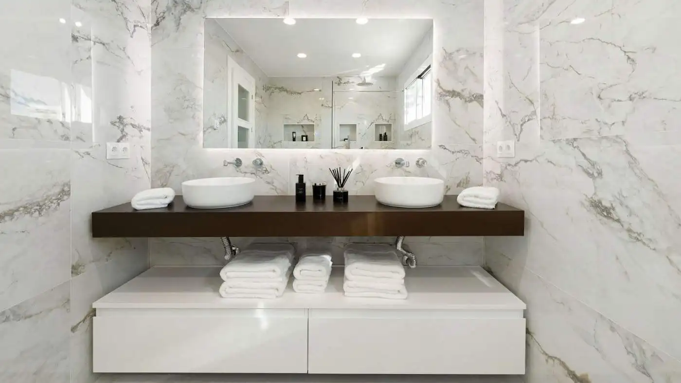 Luxurious duplex penthouse bathroom with modern design and panoramic city views.