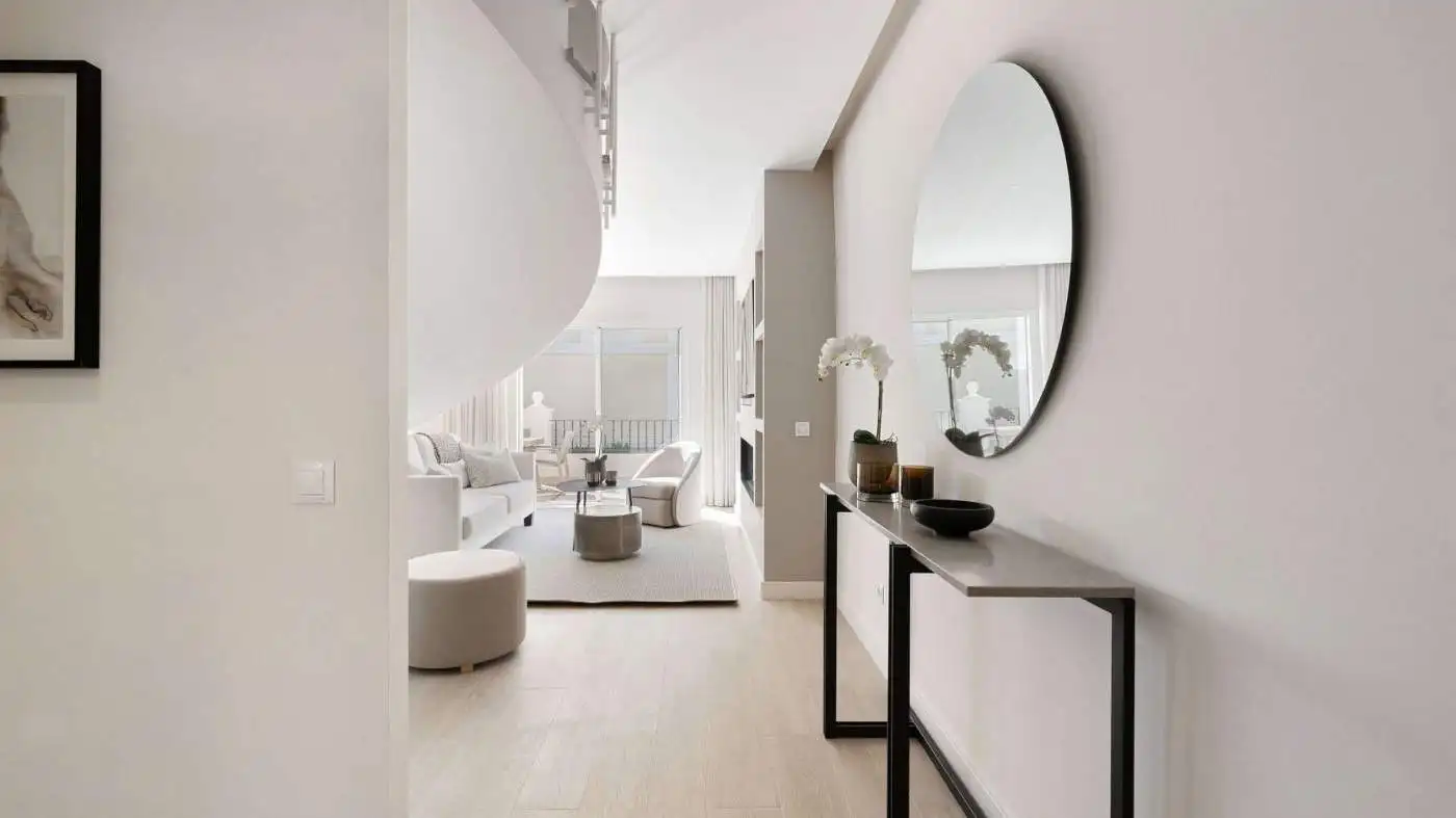 Elegant duplex penthouse living room with modern decor and panoramic views.