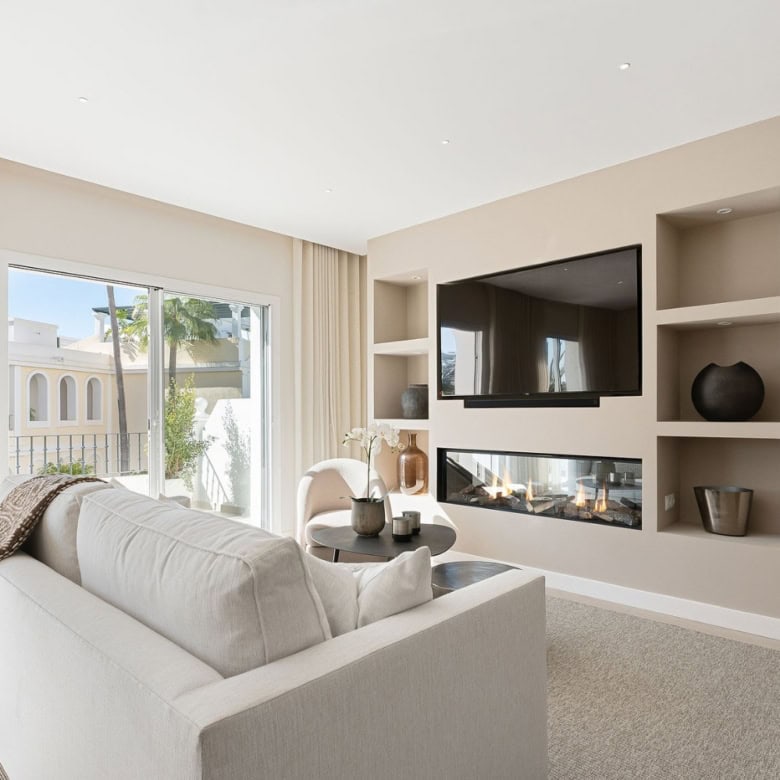 Bright living room in Aloha Gardens panoramic duplex penthouse with large windows and contemporary d.