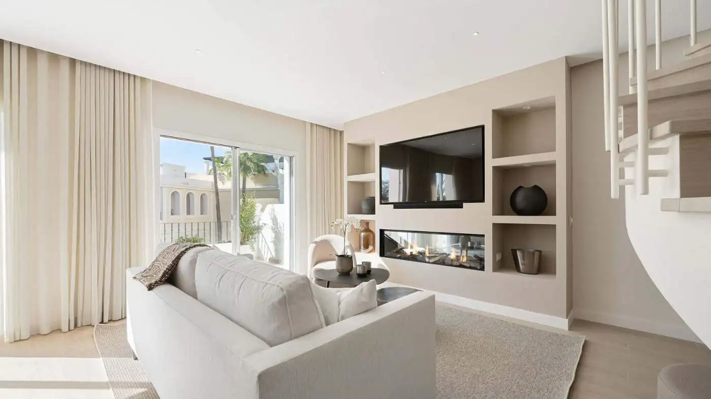 Bright living room in Aloha Gardens panoramic duplex penthouse with large windows and contemporary d.