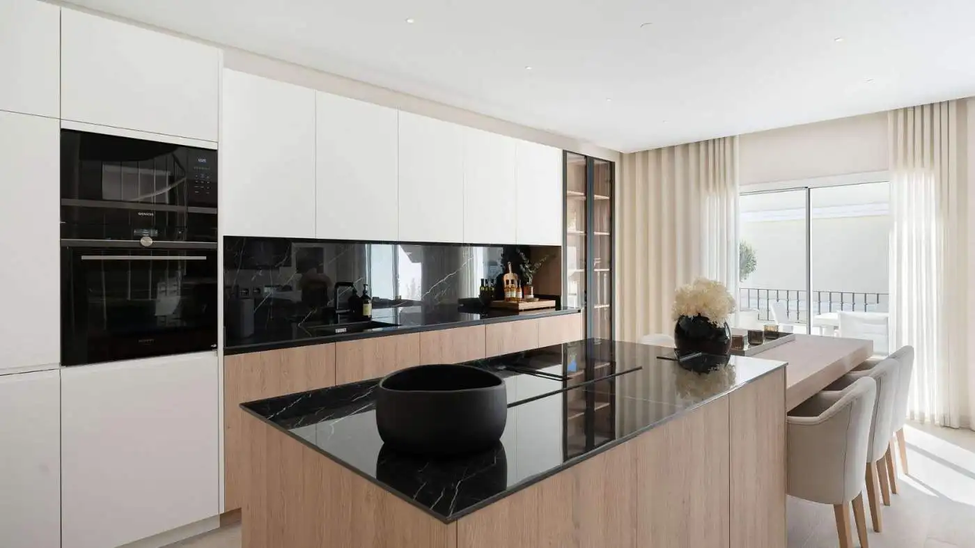Modern panoramic duplex penthouse kitchen with sleek design and spacious layout.