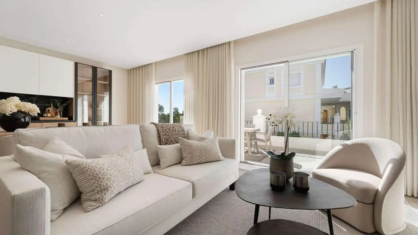 Elegant living room with large windows and balcony views.