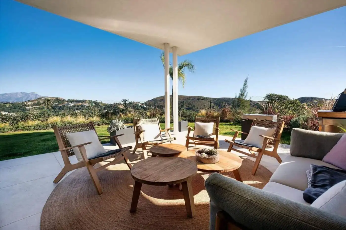 Outdoor terrace with mountain and sea views in Marbella Club Hills.