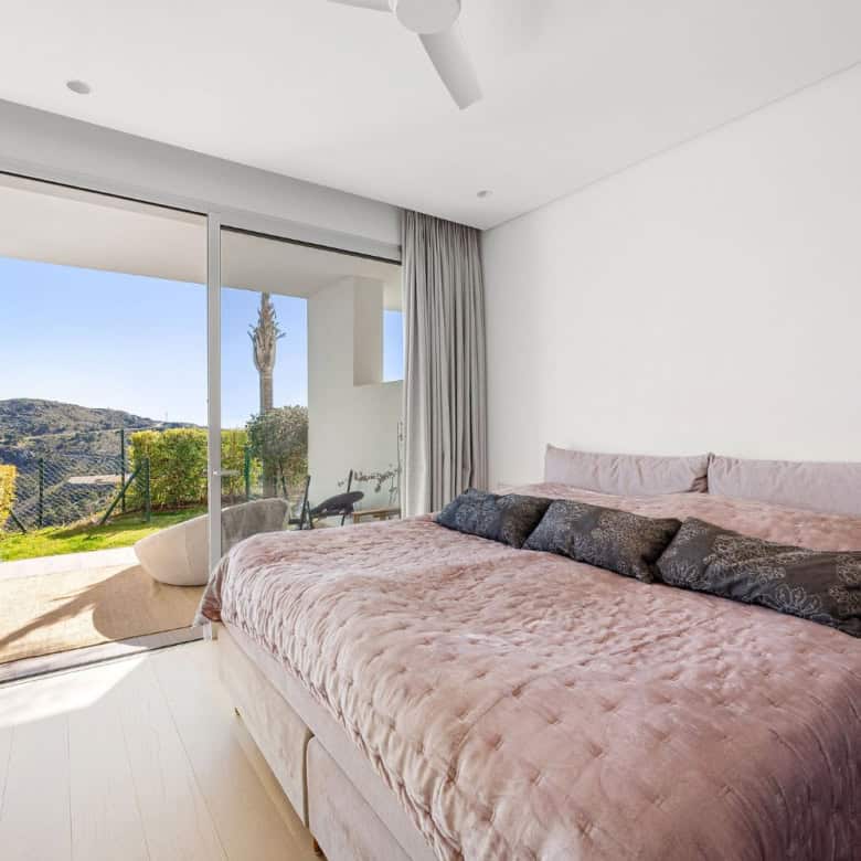 Modern duplex apartment with sea and mountain vistas in Marbella Club Hills, Benahavis. Bright, spac.