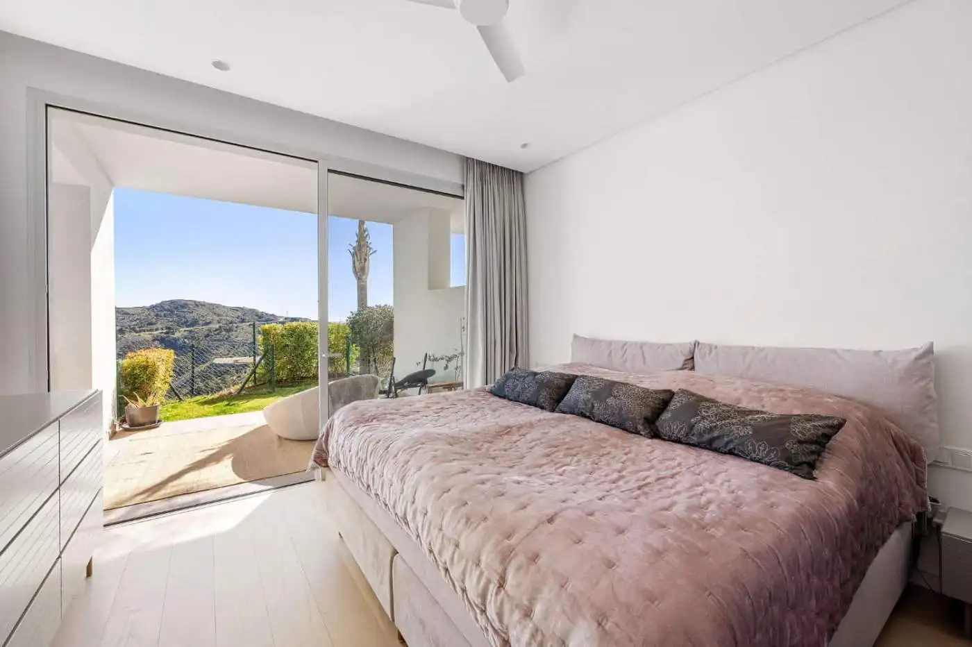 Modern duplex apartment with sea and mountain vistas in Marbella Club Hills, Benahavis. Bright, spac.