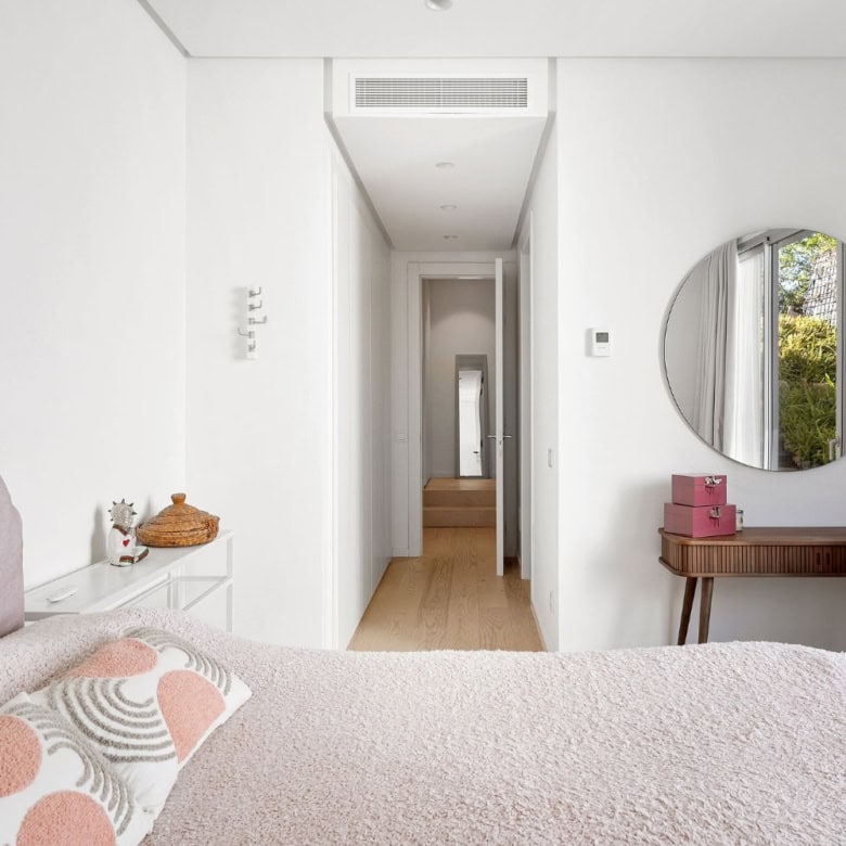 Bright and airy bedroom with minimalist decor and sea views in Marbella Club Hills.