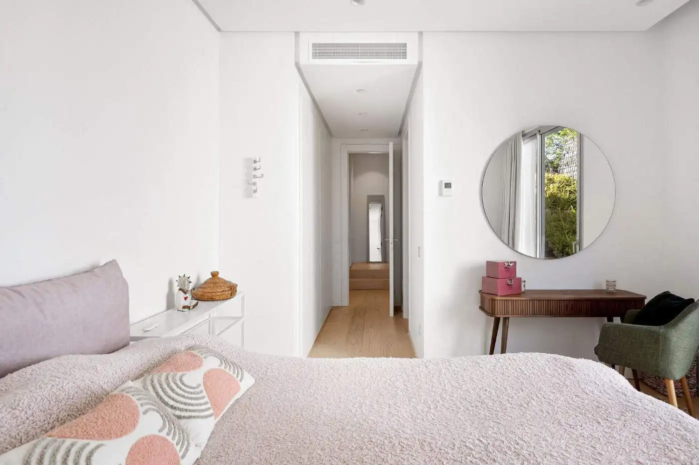 Bright and airy bedroom with minimalist decor and sea views in Marbella Club Hills.