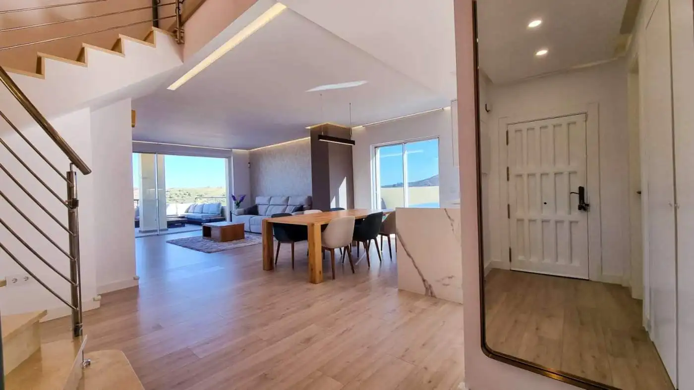 Elegant fully renovated penthouse offering panoramic sea vistas in San Roque Club. Modern interiors.