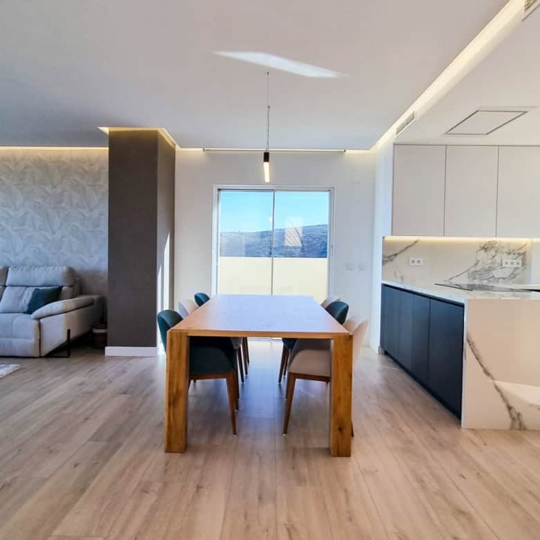 Bright, modern living space with panoramic sea views and stylish interior design. Perfect for luxury.