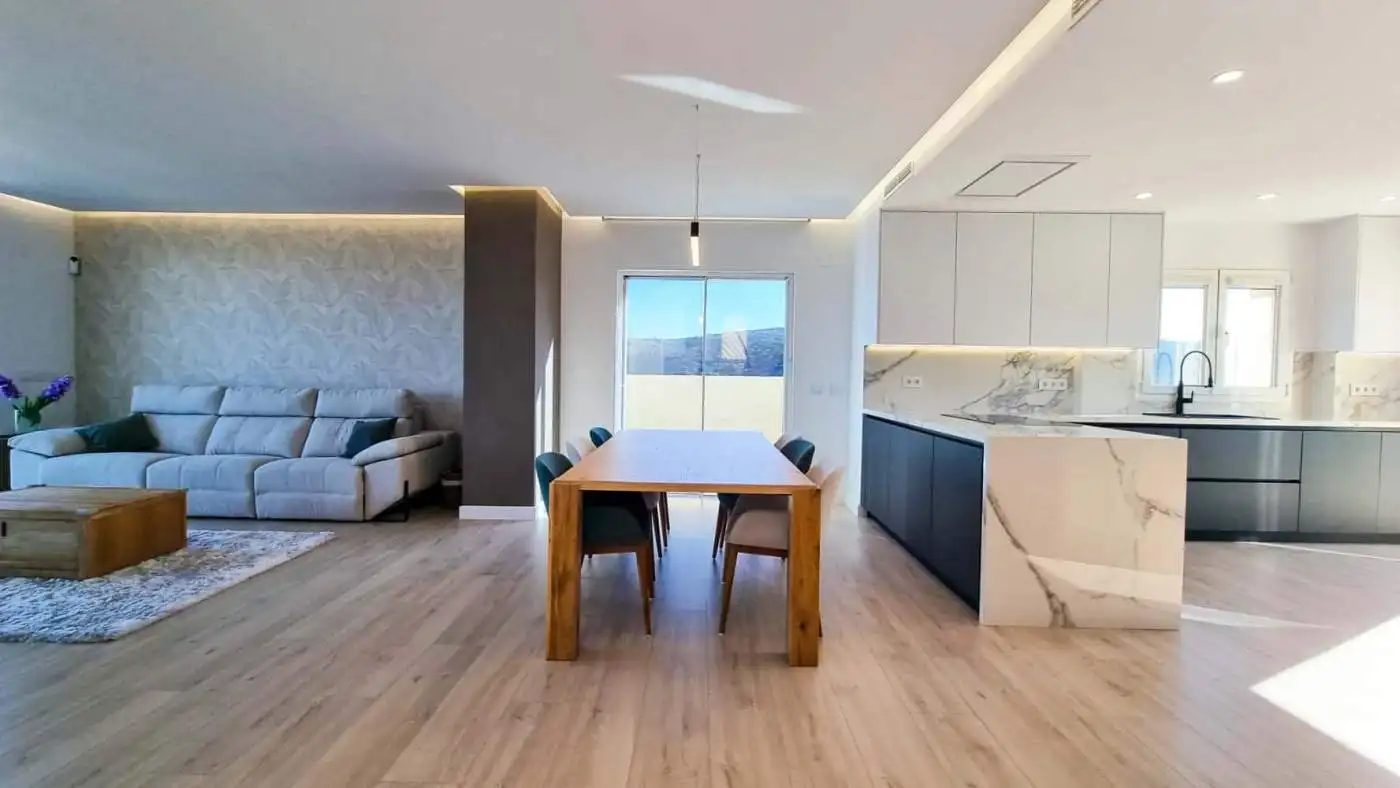 Bright, modern living space with panoramic sea views and stylish interior design. Perfect for luxury.