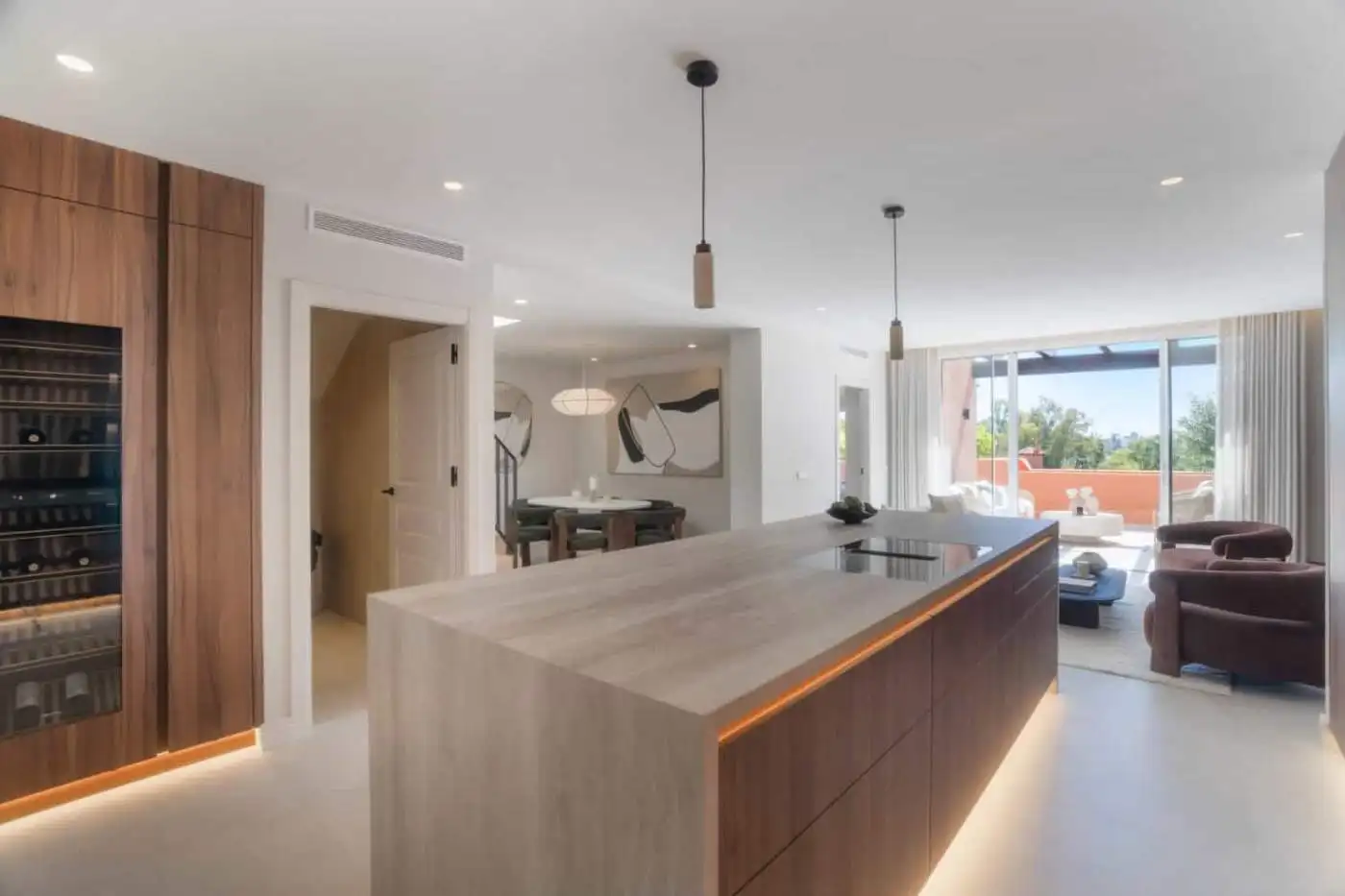 Luxury duplex penthouse in Marbella with modern design and spacious living area.