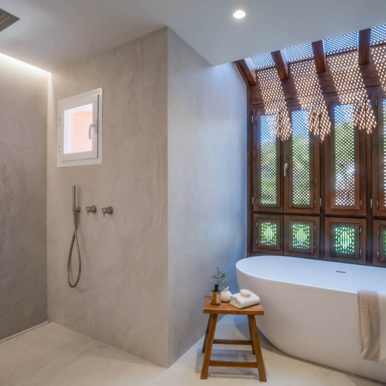 Luxury duplex penthouse bathroom with modern design and natural light in Marbella.