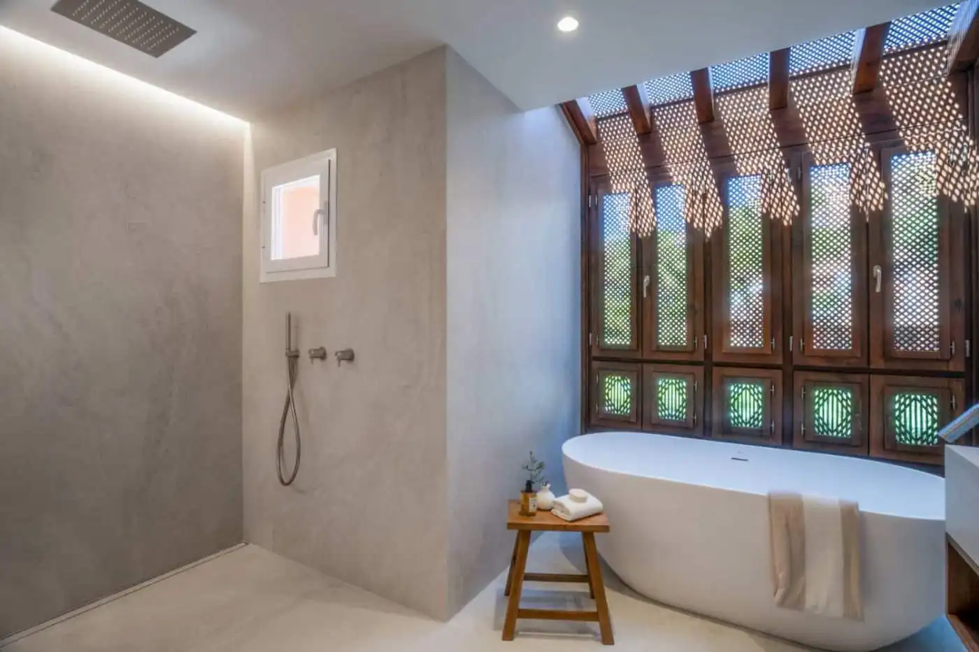 Luxury duplex penthouse bathroom with modern design and natural light in Marbella.