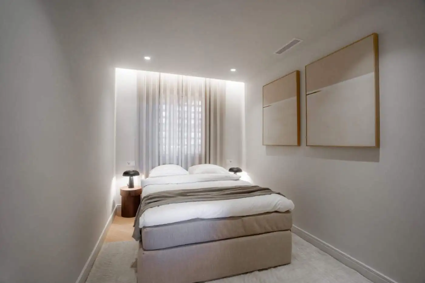 Renovated duplex penthouse bedroom with natural light in Marbella.