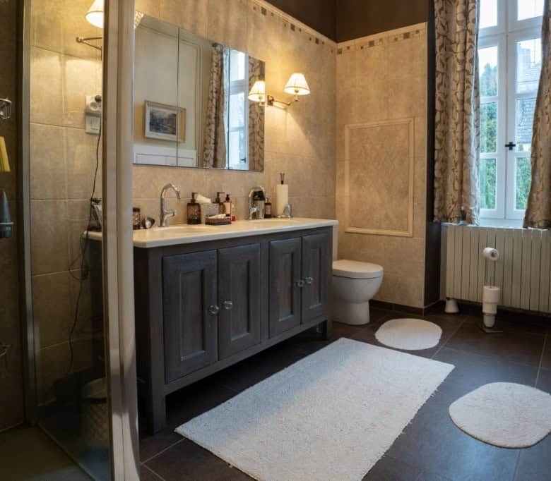 Spacious bathroom in a stunning 5-bedroom house for sale in Chateaudun, France, featuring elegant de.