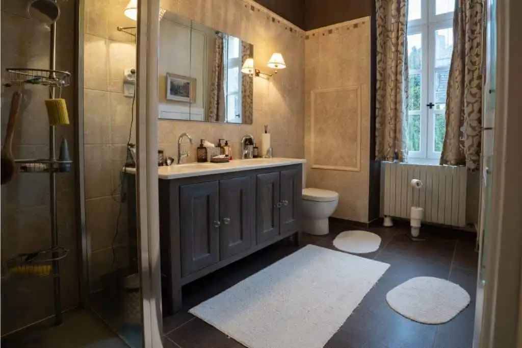 Spacious bathroom in a stunning 5-bedroom house for sale in Chateaudun, France, featuring elegant de.