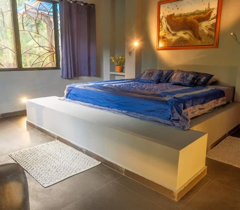 Comfortable bedroom at the Flowing River Retreat in Llurimagua Ecuador.