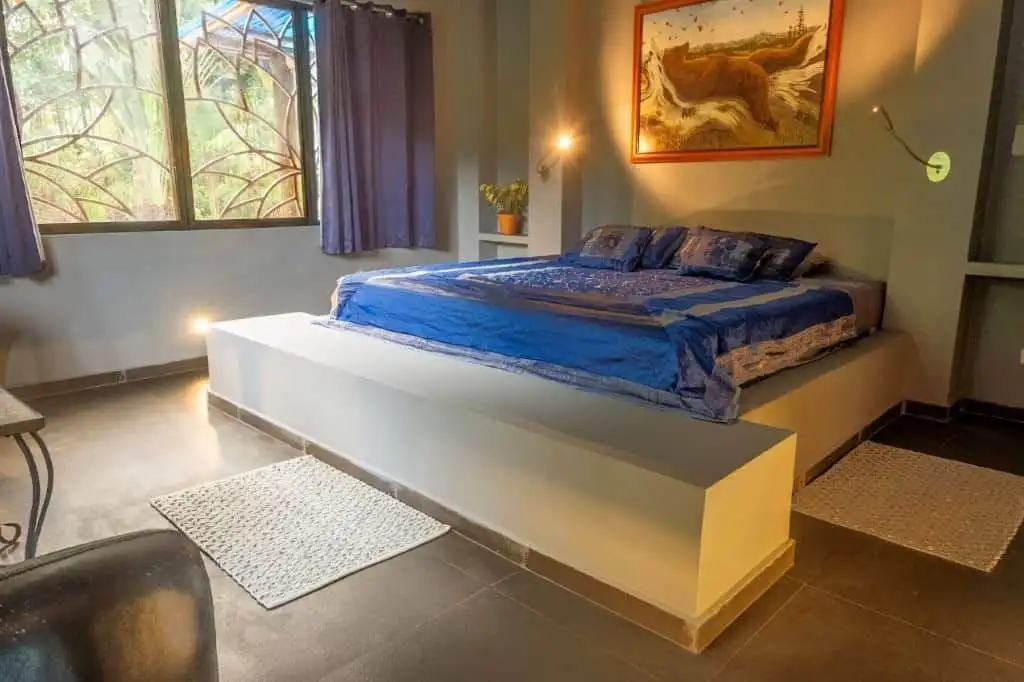 Comfortable bedroom at the Flowing River Retreat in Llurimagua Ecuador.