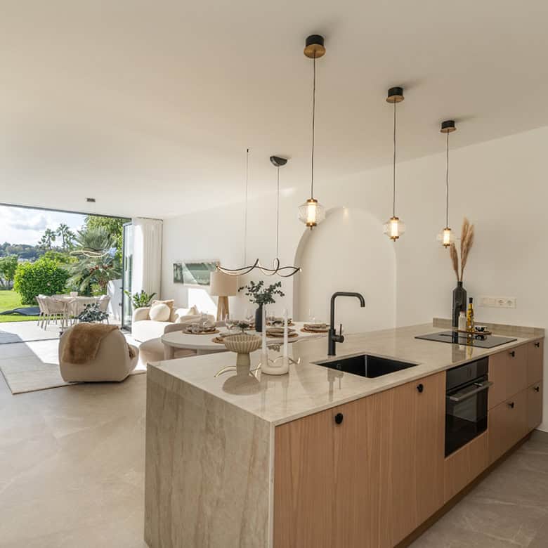 Spacious Marbella golf valley townhouse with open-plan kitchen and bright living space, perfect for.