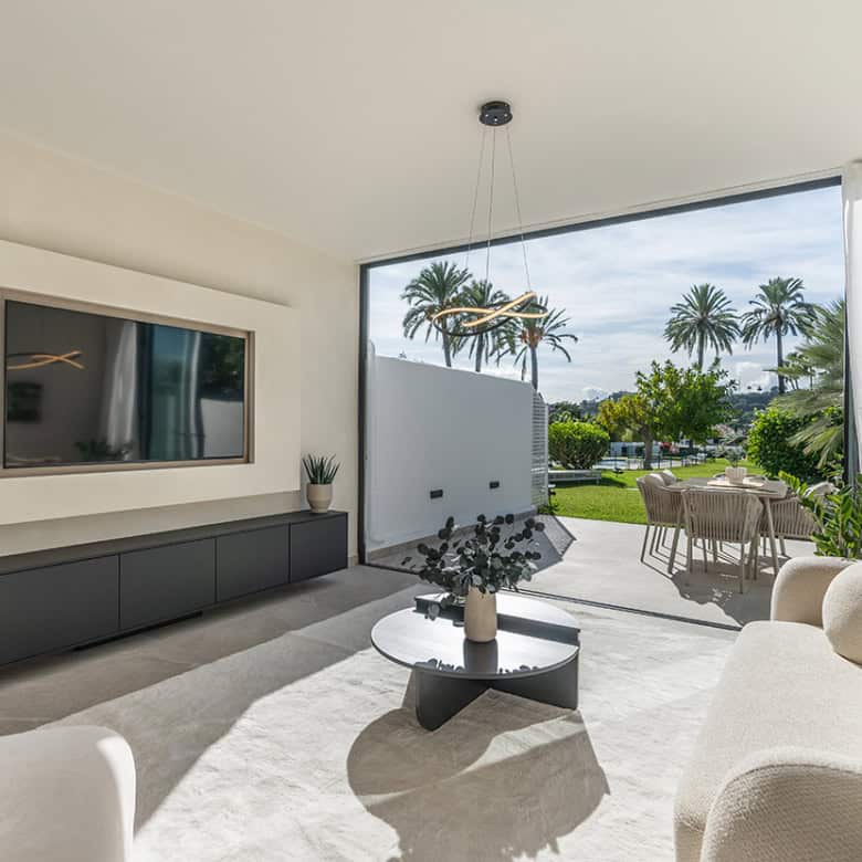 Spacious Marbella townhouse featuring modern interiors and a large outdoor garden area. Perfect for.