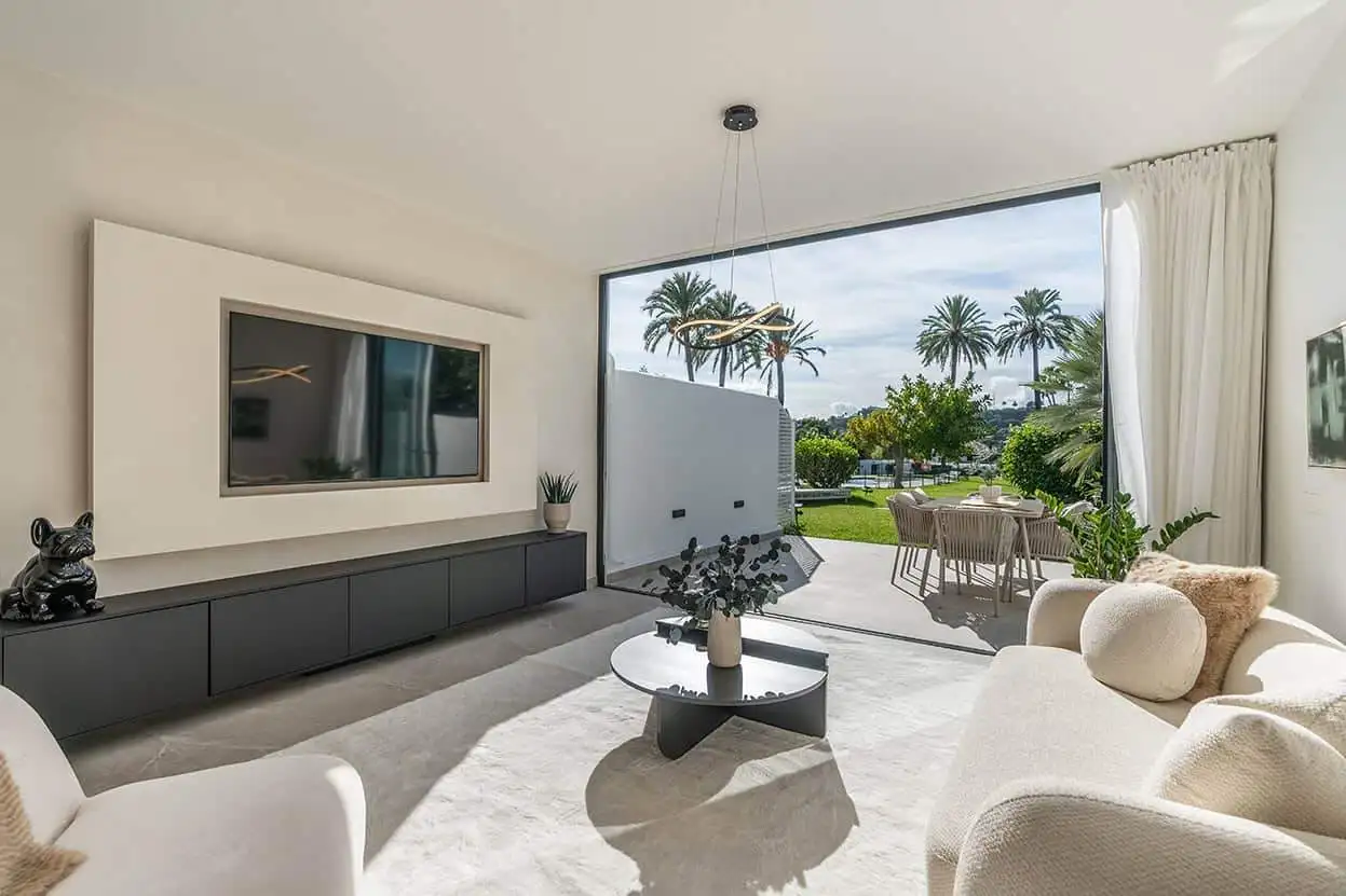 Spacious Marbella townhouse featuring modern interiors and a large outdoor garden area. Perfect for.