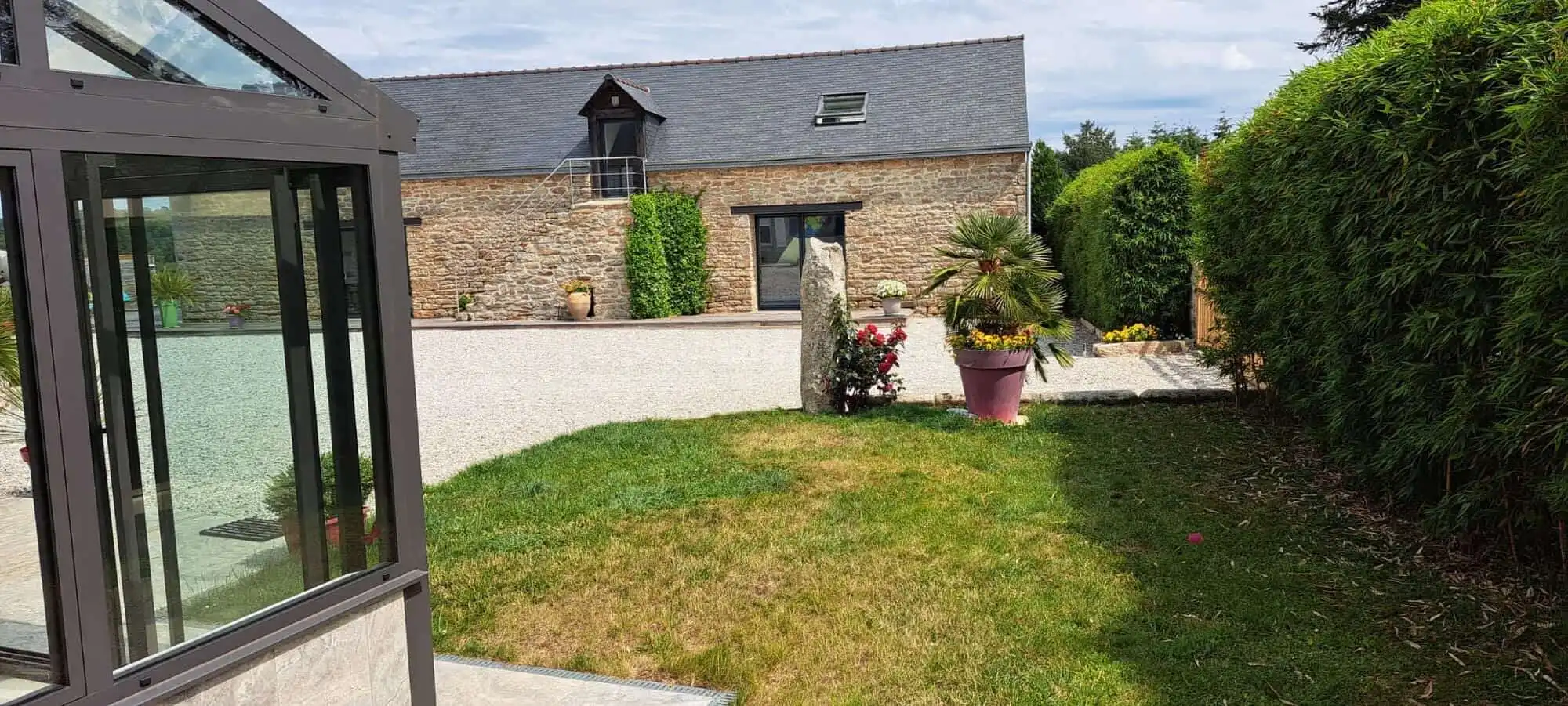 Luxury 12 Bed Estate for Sale in Scaer Brittany, featuring a spacious garden and modern amenities.