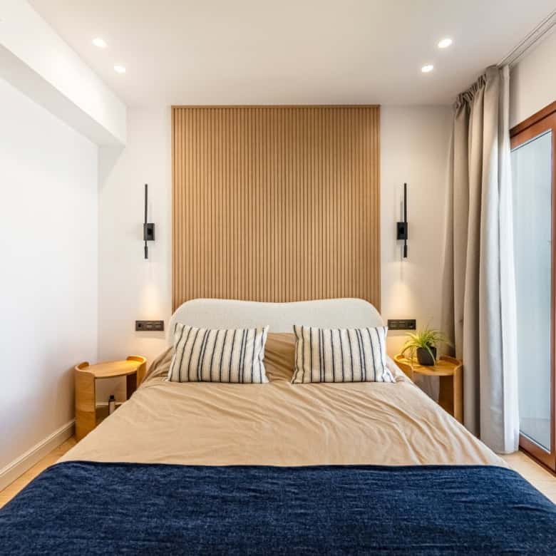Refurbished townhouse bedroom with stylish decor in Los Arqueros Benahavis.