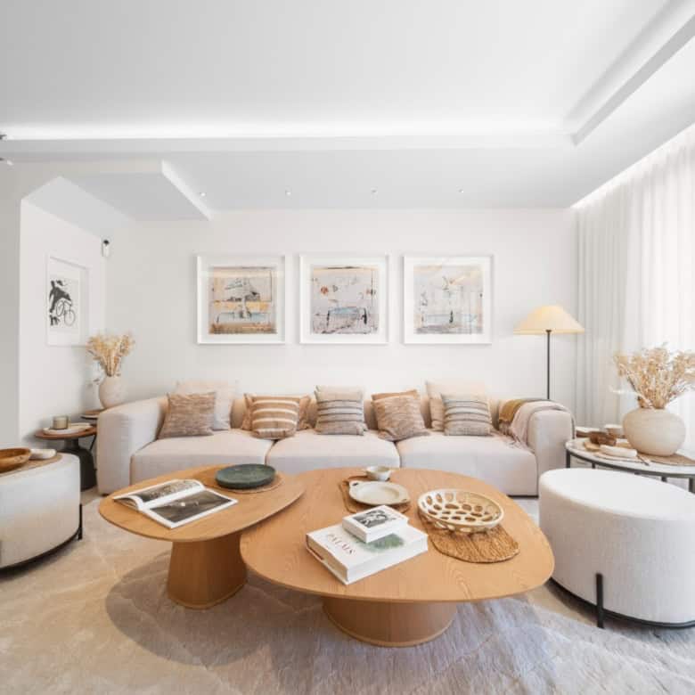 Elegant interior with neutral tones, stylish furniture, and natural light.