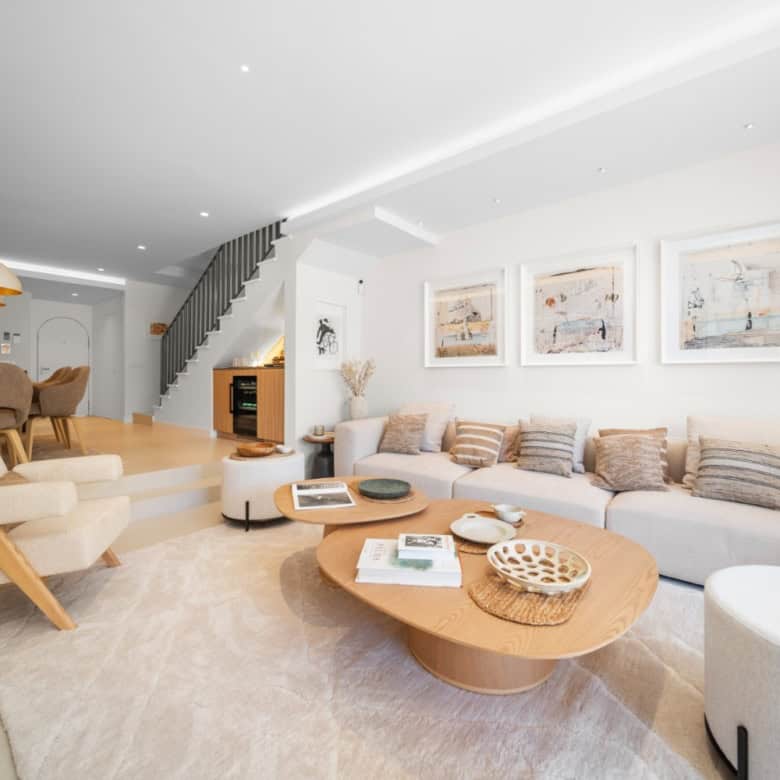 Spacious living room of a luxury turnkey townhouse in El Palmeral, Nueva Andalucía, featuring modern.