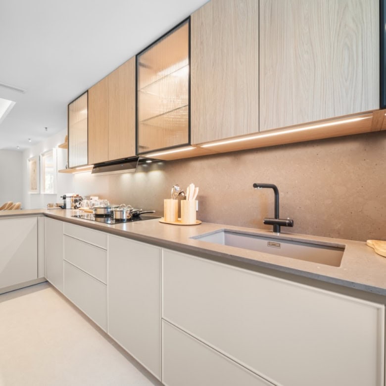 Modern kitchen with sleek cabinetry and contemporary design in El Palmeral, Nueva Andalucía.
