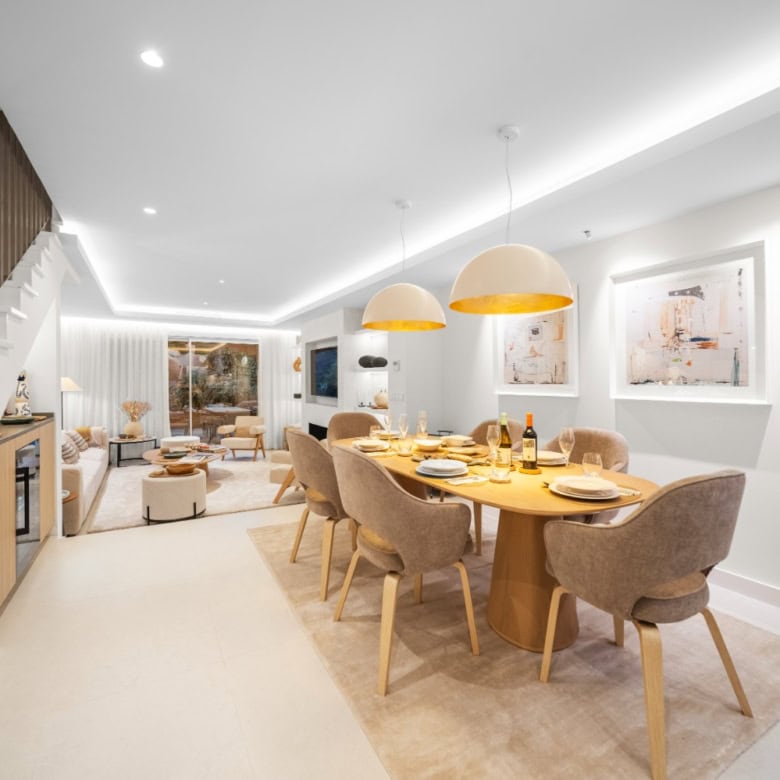 Modern dining room in luxury townhouse in El Palmeral, Nueva Andalucía. Bright, stylish, and ready f.