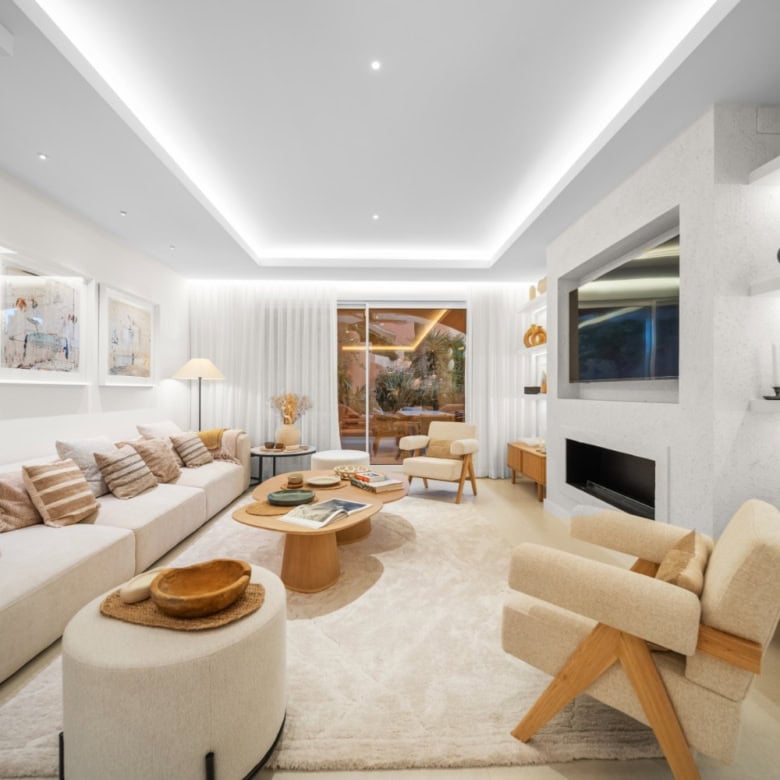 Modern living room in luxury townhouse, El Palmeral, Nueva Andalucía, with stylish furniture and ele.