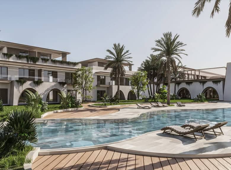Luxury Caribbean resort pool with palm trees and modern architecture.