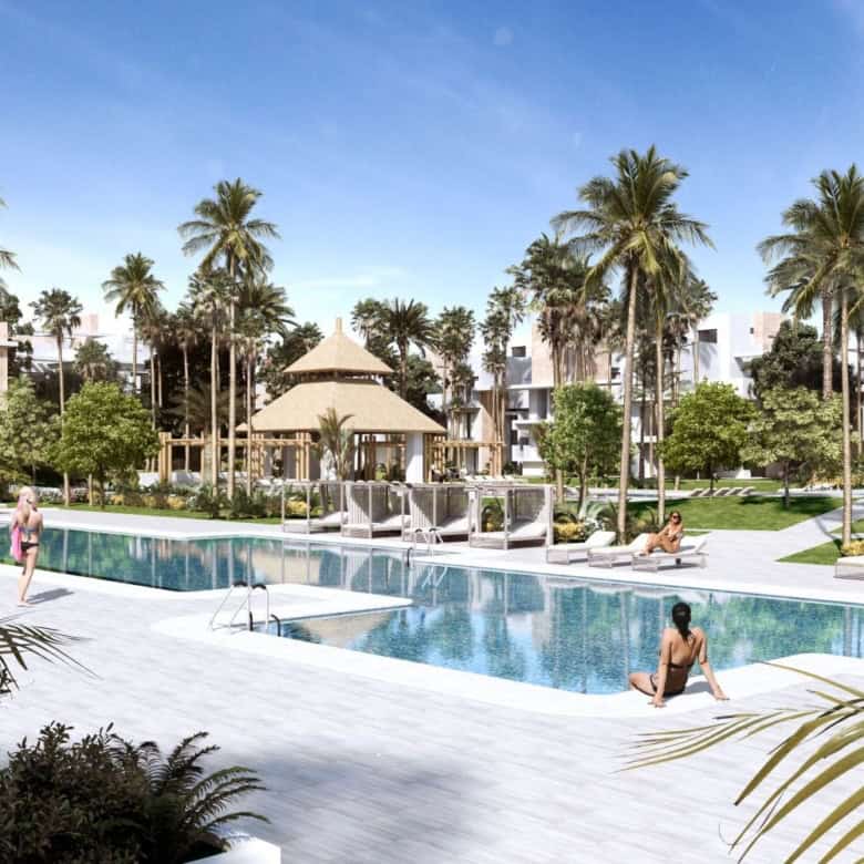 Beautiful view of the Ayana 2-bedroom first-floor apartment with pool and tropical surroundings.