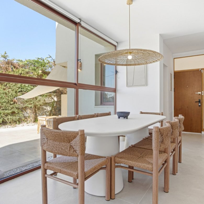 Elegant interior of a 5-bedroom corner townhouse in Cancelada, Estepona, featuring bright living spa.