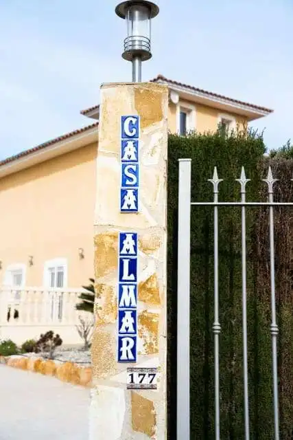 Charming villa entrance with "Casa Almar" sign in Totana Murcia, perfect for a spacious family home.