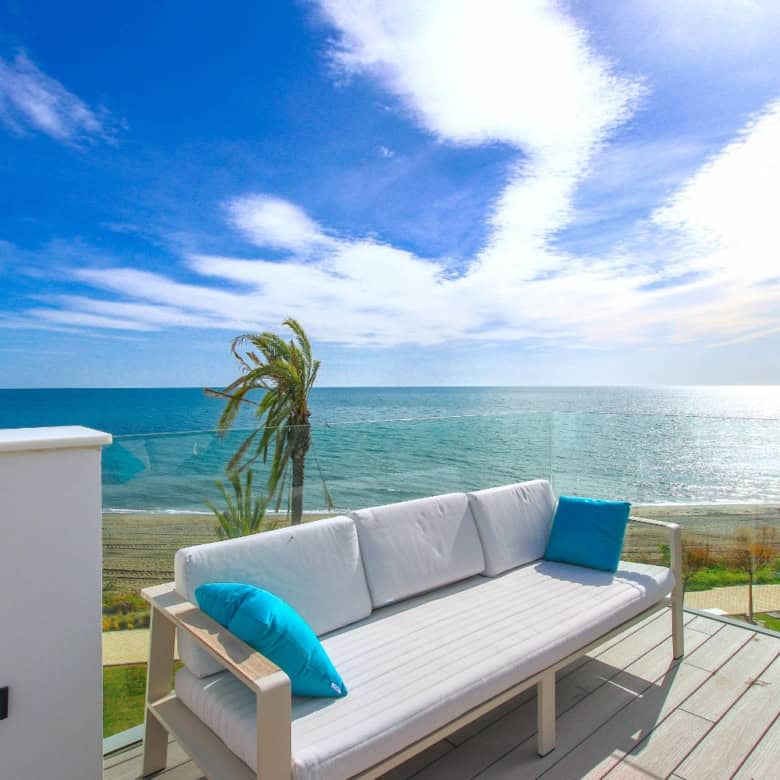 Beachfront townhouse with sea views in Estepona West.