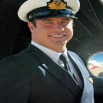 Captain in uniform smiling, close-up.