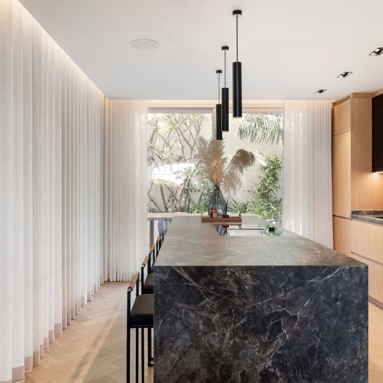 Luxury townhouse kitchen with modern design and natural light in Marbella.