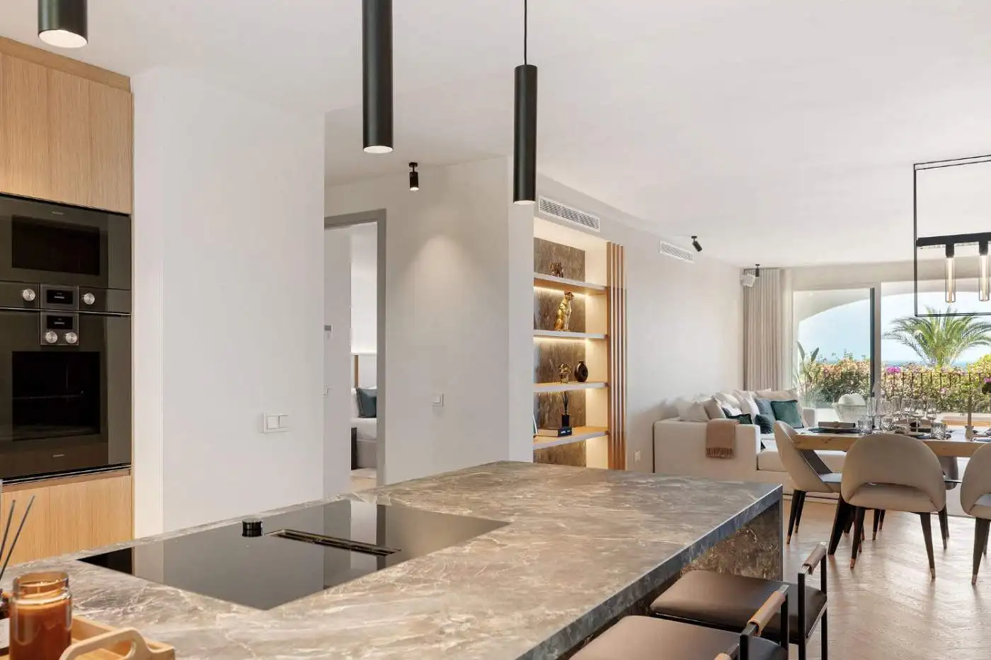 Modern townhouse kitchen and living area in Marbella's Golden Mile. Elegant design with open-plan la.