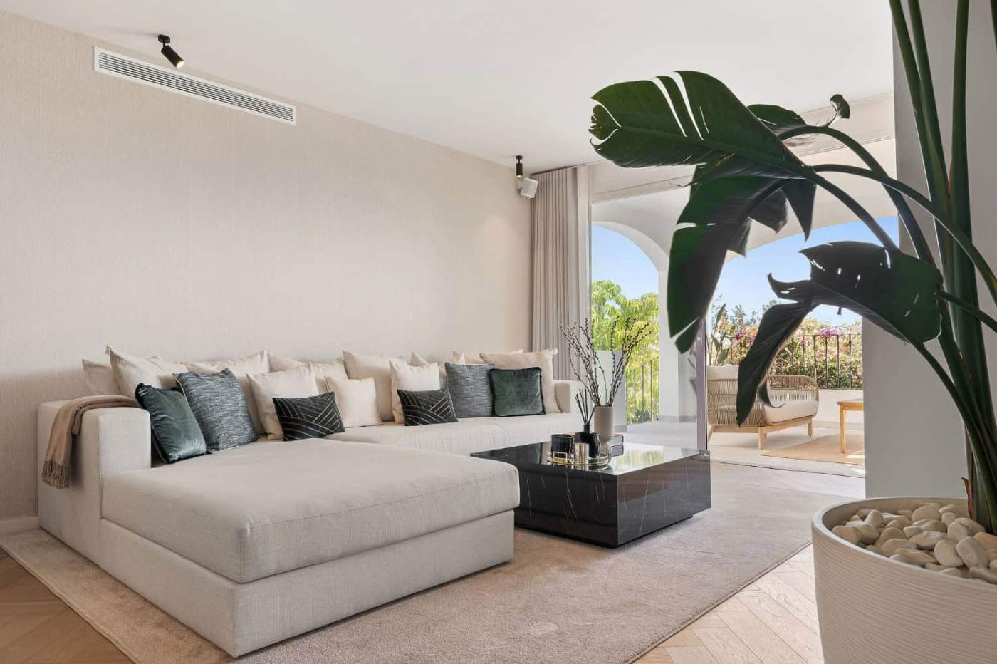 Luxury Townhouse Living Room in Marbella Elegant Marbella townhouse living room with modern decor and spacious seating area.