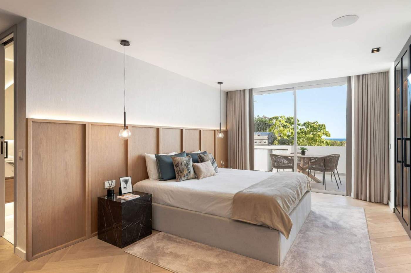 Luxury Townhouse Bedroom in Marbella Luxury bedroom with modern decor and sea view in Marbella.